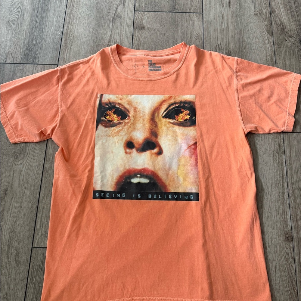 Travis Scott x Texas Chainsaw Live in NY Seeing is Believing Orange Tee